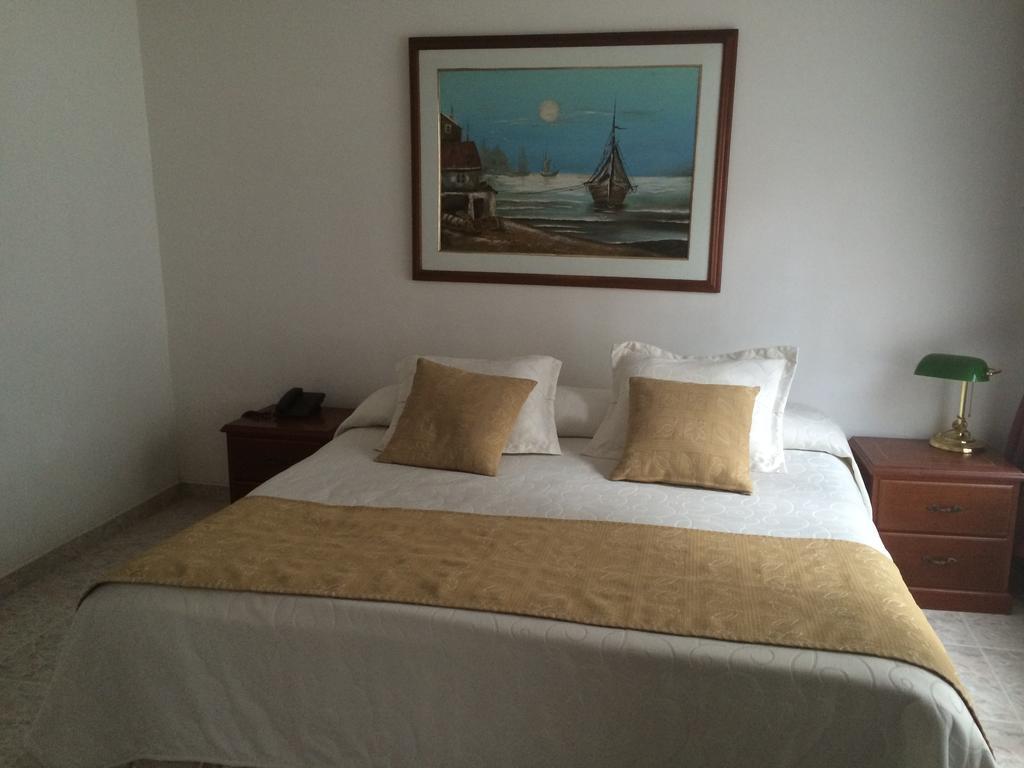 Hotel Bolivar Plaza Манісалес Номер фото